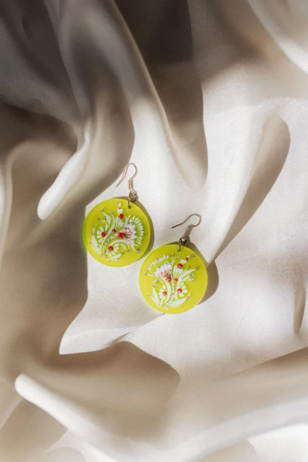 Green Plastic Earrings with Floral Pattern